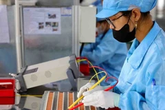 Electronic component production. (Photo: VNA)
