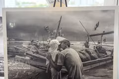 Photographs by photographer My Dung on display at the exhibition. (Photo: VNA)