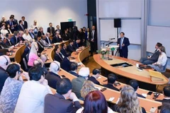 Prime Minister Pham Minh Chinh delivers a policy address at the Stockholm School of Economics as part of his ongoing visit to Sweden. (Photo: VNA)