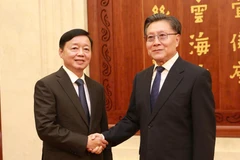 Deputy Prime Minister Tran Hong Ha (L) and Wang Dongming, Vice Chairman of the Standing Committee of the National People's Congress of China. (Photo: VNA)