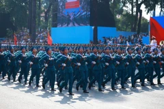 The male Maritime Militia troops march past the grandstand. Photo: VNA