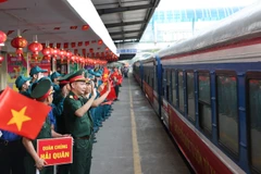 Parade troops warmly welcomed back to Hanoi