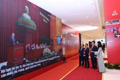 VNA photo exhibition highlights nation’s new era under Party leadership