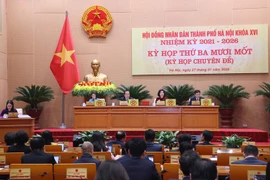Hanoi's 100-year master plan resolution is adopted at the 31st session of the municipal People's Council on January 27. (Photo: VNA)