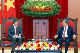 Party General Secretary To Lam meets Rector of the Russian Presidential Academy of National Economy and Public Administration (RANEPA) Alexey Komissarov. (Photo: VNA)