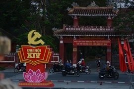 Banners and decorations welcoming the 14th National Congress of the Communist Party of Vietnam are displayed at the central park in Hue city. (Photo: VNA)
