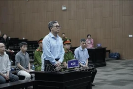 Former Deputy Minister of Industry and Trade Hoang Quoc Vuong at the court hearing on April 21, 2025. (Photo: VNA)