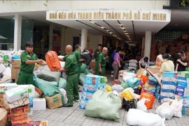 A relief collection point for goods and essential supplies at the Ho Chi Minh City's Youth Cultural House. (Photo: VNA)