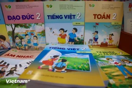 Complete textbook sets are now available at bookstores nationwide, ahead of the upcoming school year. (Photo: VietnamPlus)