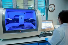 Inside the microbiological laboratory for tuberculosis diagnostics at the National Lung Hospital. (Photo: VNA)