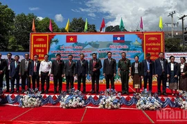 Delegates at a ceremony to commence the expansion project of the Vang Vieng district hospital, Laos. (Photo: VNA)