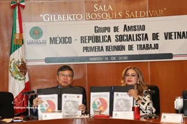 The signing ceremony of the Vietnam–Mexico parliamentary cooperation. agenda. (Photo: VNA)