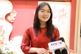 Nguyen Thi Thuy Linh, a third-year student majoring in Chinese language at Beijing Language and Culture University, speaks in an interview with a Vietnam News Agency correspondent in Beijing. (Photo: VNA)