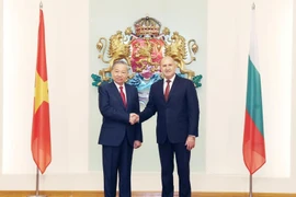 Party General Secretary To Lam (L) and Bulgarian President Rumen Radev at the Presidential Palace. (Photo: VNA)