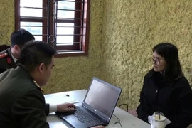 Hoang Thi Hong Thai at the police office. (Photo: Hanoi Department of Public Security)