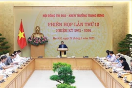 Prime Minister Pham Minh Chinh, Chairman of the Central Council for Emulation and Commendation for the 2021–2026 tenure, chairs the council’s 12th session in Hanoi, June 28, 2025. (Photo: VNA)