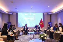 Deputy Prime Minister Bui Thanh Son receives Lao Deputy Minister of Technology and Communications Saysana Sitthiphone on the occasion of his attendance at the 2025 Autumn Economic Forum in Ho Chi Minh City. (Photo: VNA)