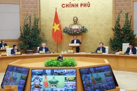 Prime Minister Pham Minh Chinh chairs the Government’s regular meeting for January 2026 held online with localities on February 4. (Photo: VNA)