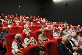 French audience at the documentary screening. (Photo published by VNA) 