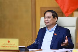 Prime Minister Pham Minh Chinh chairs a meeting with ministry and sector leaders on preparations for the exhibition, to be held in celebration of the 80th anniversary of the National Day (September 2, 1945 –2025). (Photo: VNA)