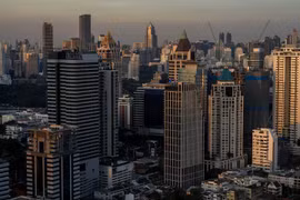 Skyscrapers are lit by the setting sun in Bangkok, Thailand, January 4, 2023. (Photo: Reuters)