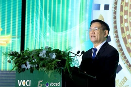 Deputy Prime Minister Ho Duc Phoc delivers a speech at the 12th Vietnam Corporate Sustainability Forum (VCSF) in Hanoi on August 22. (Photo: VNA)