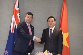 Vietnamese Deputy Prime Minister Tran Hong Ha (R) and New Zealand Deputy Prime Minister David Seymour. (Photo: VNA)
