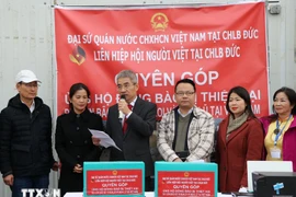 The Vietnamese community in Germany organises a fundraising event to support people affected by Storm Bualoi at home. (Photo: VNA)
