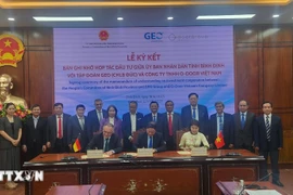 The signing ceremony between Germany’s GEO Group and Vietnam’s O-DOOR Company for a project to establish a Training and Human Resources Development Centre for Renewable Energy in Gia Lai province. (Photo: VNA) 