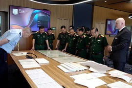  National Steering Committee 515 holds a working session with the Australian Army's Unrecovered War Casualties Unit. (Photo: qdnd.vn)