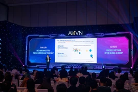 At the plenary session of AI Day 2025. (Photo: VNA)