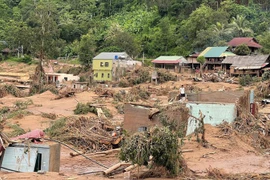 Hundreds of houses in My Ly commune, Nghe An province, are damaged after floods in July 2025. (Photo published by VNA)