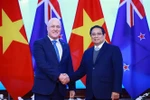 Prime Minister Pham Minh Chinh and New Zealand Prime Minister Christopher Luxon pose for a photo ahead of their talks. (Photo: VNA)