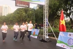 Ambassador Pham Viet Hung (far right) completes the 2.5km course at the event. (Photo: VNA)