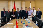 The working session between the delegations of the University of Foreign Language Studies under the University of Da Nang and the Far Eastern Federal University of Russia (Photo: VNA)