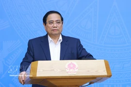Prime Minister Pham Minh Chinh speaks at the conference. (Photo: VNA)