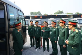 Deputy Minister of National Defence Sen. Lieut. Gen Le Huy Vinh examines transport preparations at Brigade 971 on January 12. (Photo: mod.gov.vn)