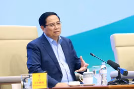 Prime Minister Pham Minh Chinh speaks at the dialogue with farmers on December 10. (Photo: VNA)