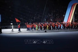 The Vietnam sports delegation at the opening ceremony of SEA Games 33. (Photo: VNA)