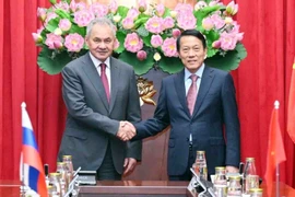 Minister of Public Security General Luong Tam Quang (right) and Secretary of the Russian Federation Security Council Sergei Shoigu at their meeting in Hanoi on December 9 (Photo: VNA)