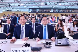 PM Pham Minh Chinh (right) and Deputy PM and Minister of Foreign Affairs Bui Thanh Son at the opening session of the third UN Ocean Conference in Nice, France, on June 9. (Photo: VNA)