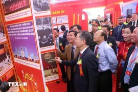 Visitors at the exhibition (Photo: VNA)