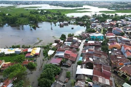 A flood-hit area in South Sulawesi, Indonesia, on December 24, 2024 (Photo: Xinua/VNA)