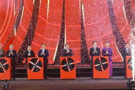 PM Pham Minh Chinh and delegates kick off the first Glorious Spring Fair 2026 (Photo: VNA)
