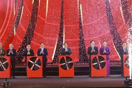 PM Pham Minh Chinh and delegates kick off the first Glorious Spring Fair 2026 (Photo: VNA)