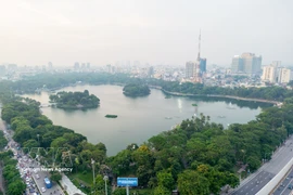 The green spaces of Thong Nhat Park help purify and regulate the climate in Hanoi (Photo: VNA)