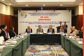 Representatives from agencies and businesses attend the conference in Beijing. (Photo: VNA)