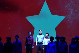 Artists on stage of the musical “Cafe Banh Mi.” (Photo: VietnamPlus)