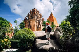 A tourist visits Ponagar Tower 2 in Khanh Hoa province. (Photo: VietnamPlus)
