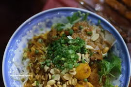An appetising bowl of My Quang features a rich combination of ingredients. (Photo: VNA)